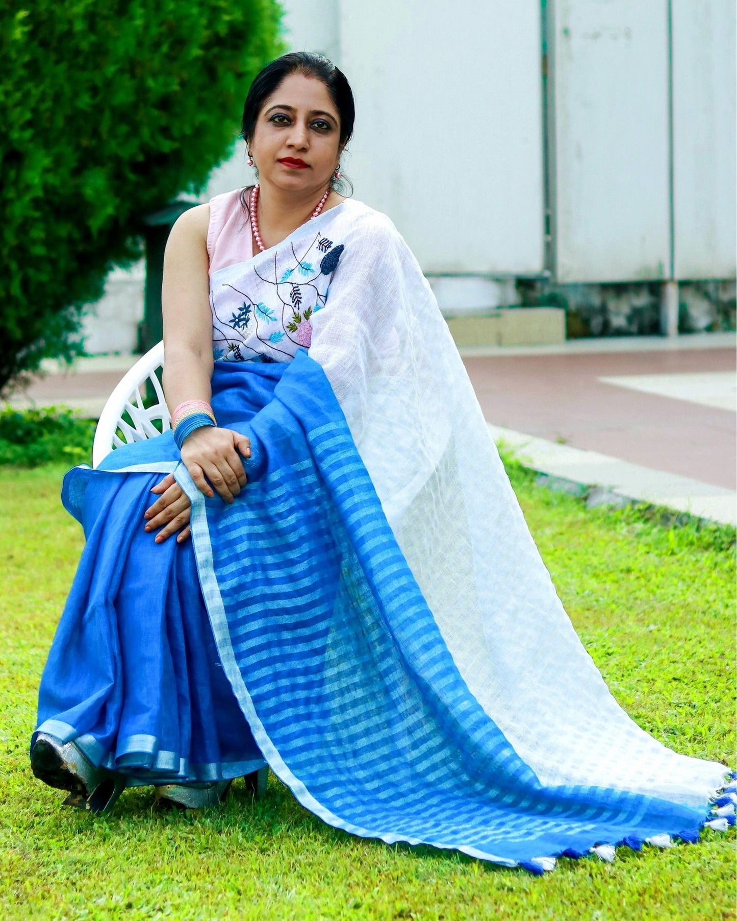 Melodic Pure Linen Saree Hand Embroidered White & Blue