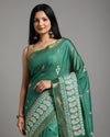 Ornamental Silk Linen Embroidered Green Saree