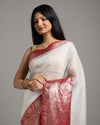 Eclipsing Banarasi Silk Linen White Handloom Saree