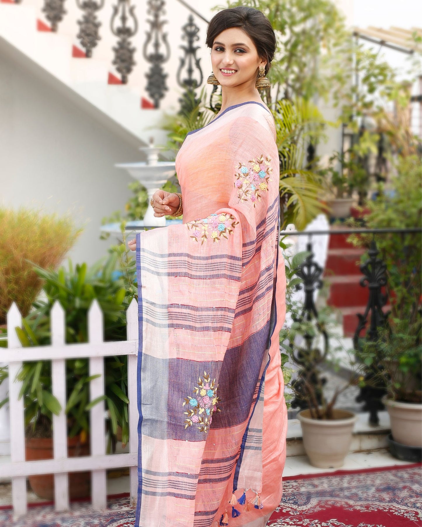 Decorous Pure Linen Floral Embroidered Peach Saree