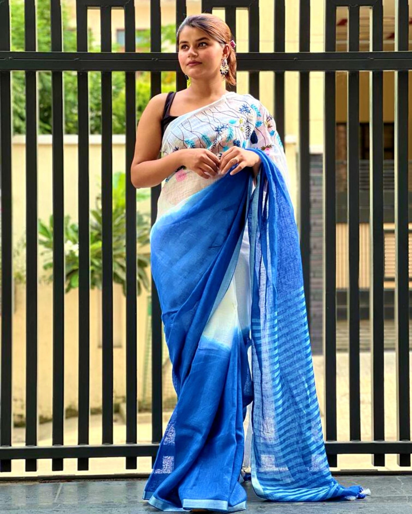 Melodic Pure Linen Saree Hand Embroidered White & Blue