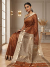 Earthy brown handloom Maheshwari silk saree with allover checks and a wide golden contrast pallu