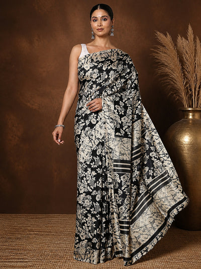 Black and beige high-contrast floral printed Kashmiri Silk saree with a striped, tree-motif pallu.