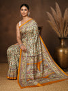 Off White printed Kashmiri silk saree with small Madhubani-style florals, a large mustard-yellow pallu panel of elephants and peacocks, and a wide contrast mustard border.