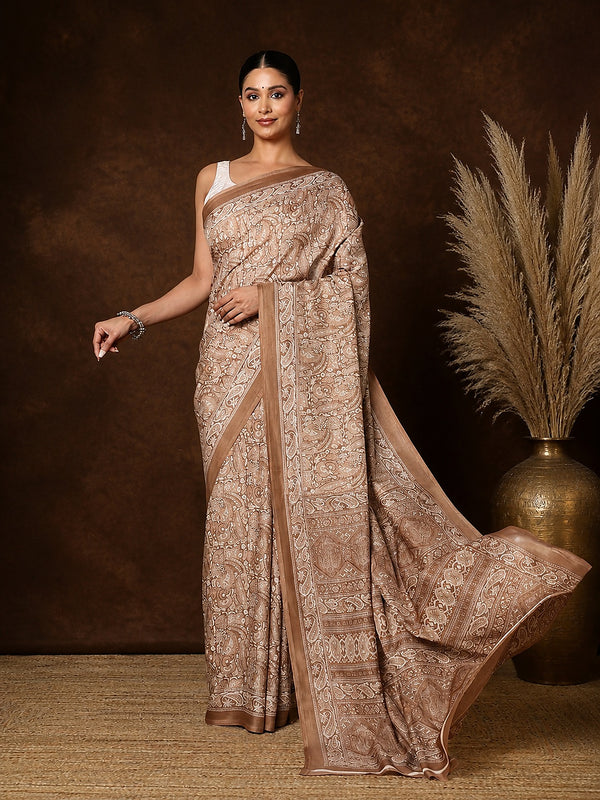 Light brown Kashmiri Silk printed saree with a dense all-over paisley and floral print, a wide banded pallu of florals and geometric lines and a narrow flat border.