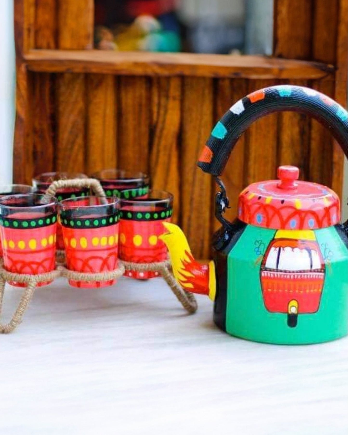 8196-Hand Painted Red coloured Aluminium Tea Kettle With Jute Stands And 6 Glasses
