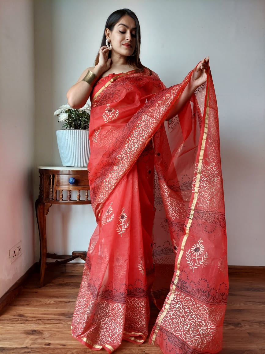 Hand Painted Organza Saree Red Colour with touch of gold print in vibrant Indian colours and matching running Blouse