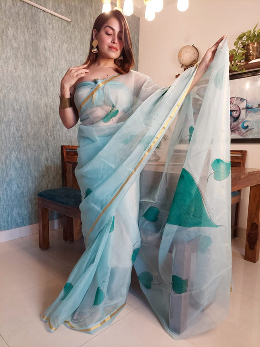 Hand Painted Organza Saree Light Green Colour with touch of gold print in vibrant Indian colours and matching running Blouse-Indiehaat