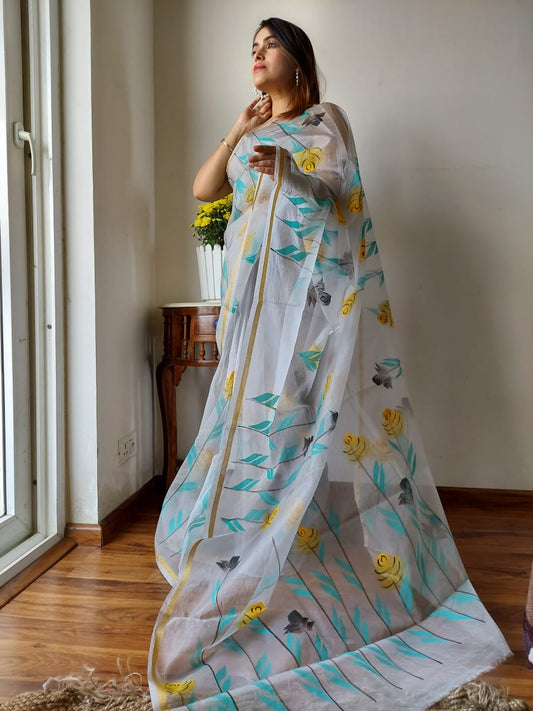 Hand Painted Organza Saree Off White Colour with touch of gold print in vibrant Indian colours and matching running Blouse-Indiehaat